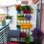 balcony garden ideas vertical balcony garden idea - colorful planters are hung on this wooden LOQKTUO