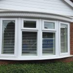 bay window shutters seen from outside house QUXCZXW