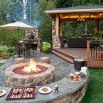 beautiful outdoor patio ideas for small backyards with umbrella beside  brick BGKHVJR