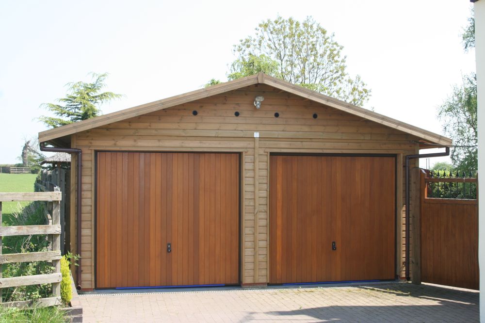double garage with cedar up u0026 over doors in the gable end MABAXWP