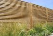 garden fence panels venetian fencing situated in a garden QYSSXPH
