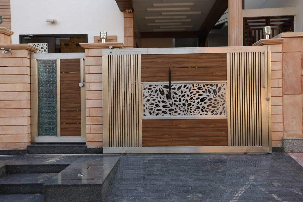 house gate design main gate design: modern houses by ravi - nupur architects ORFWHDW