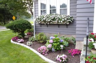 landscaping ideas for front yard 1. cheerful floral border and window boxes CPMAJLC