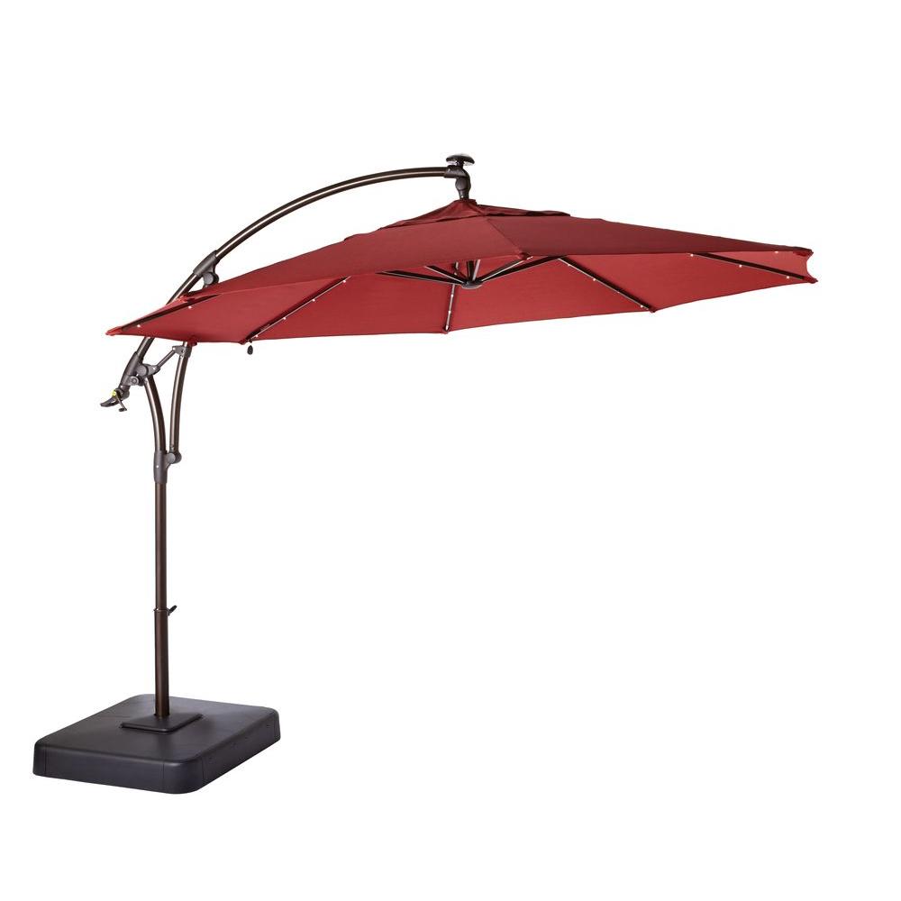 led round offset patio umbrella in chili red DJRFHFX