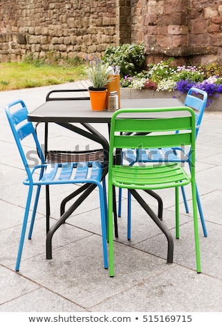 metal garden chairs metal garden furniture of table and chairs on a patio or street CHVUGEQ