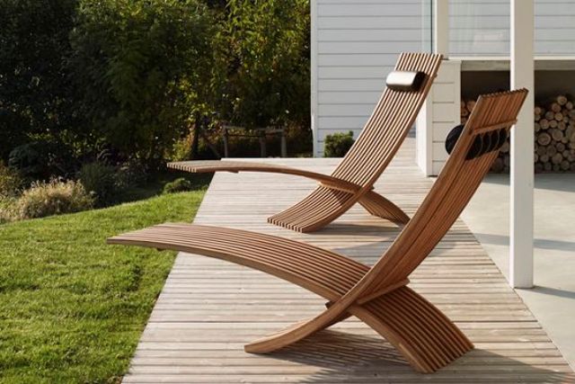 modern patio furniture modern outdoor furniture chic sculptural teak loungers for a modern outdoor CSKLPAV