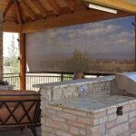 oasis patio shades driven by lutron YFEPTWB