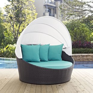 An Elegantly Luxurious Outdoor Daybed with Canopy