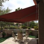 patio awnings red sunchoice awning over a medium size patio YVKBLPM