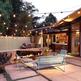 patio lighting example of a 1960s backyard patio design in santa barbara YMNBSBL