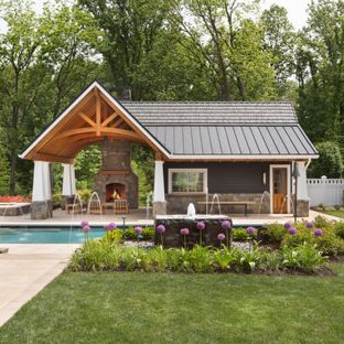 pool house ideas large elegant backyard concrete paver and rectangular lap pool house photo VPDXGJH