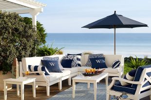 preppy navy and white patio furniture make for the perfect seaside setting. UNBYVPO