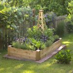 raised bed gardening a wood obelisk provides space for climbing plants in a 3x6-foot raised ABXMSZR