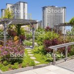 roof garden on top of apartment building stock photo TFVZFEW