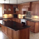 contemporary kitchen countertop ideas wood cabinets black pearl