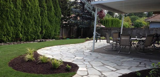 Laying a Flag stone Patio is a
  very good option to enhance the outdoor beauty