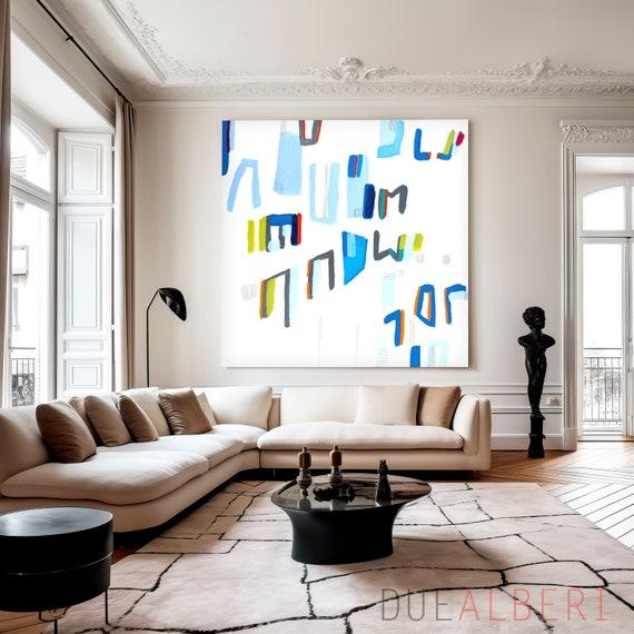 Introduce a statement art piece ⁢featuring blue‍ hues in your living⁢ room