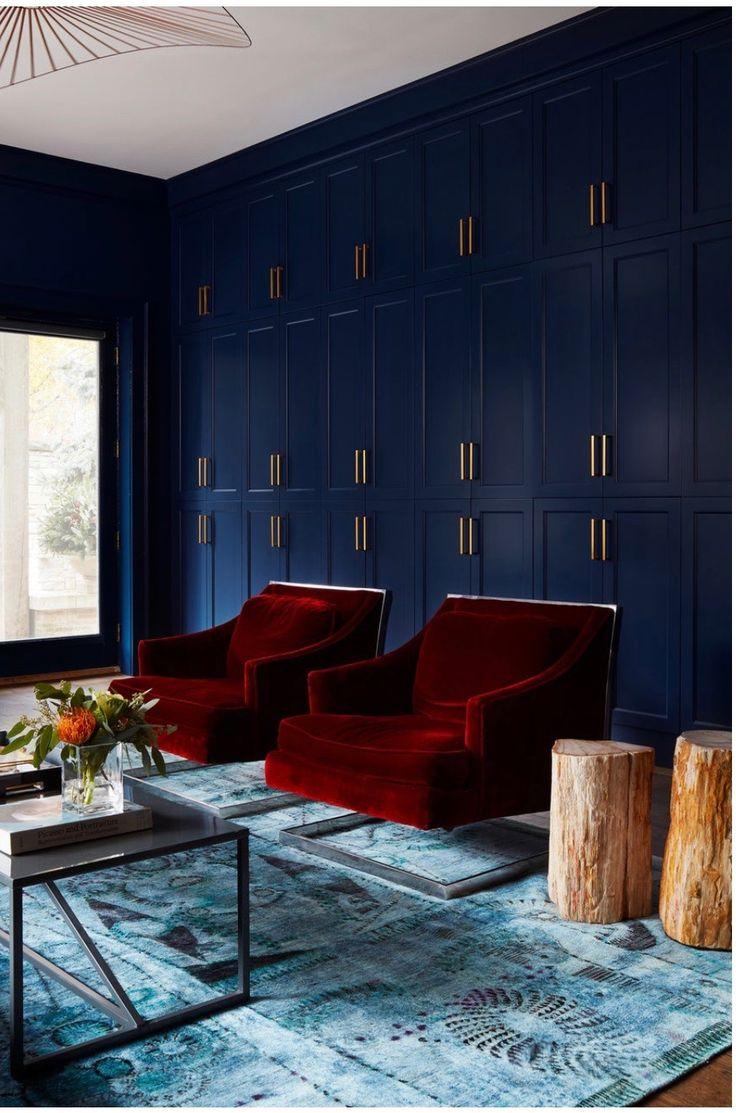 Use a mix of vintage and​ modern pieces in your blue living room