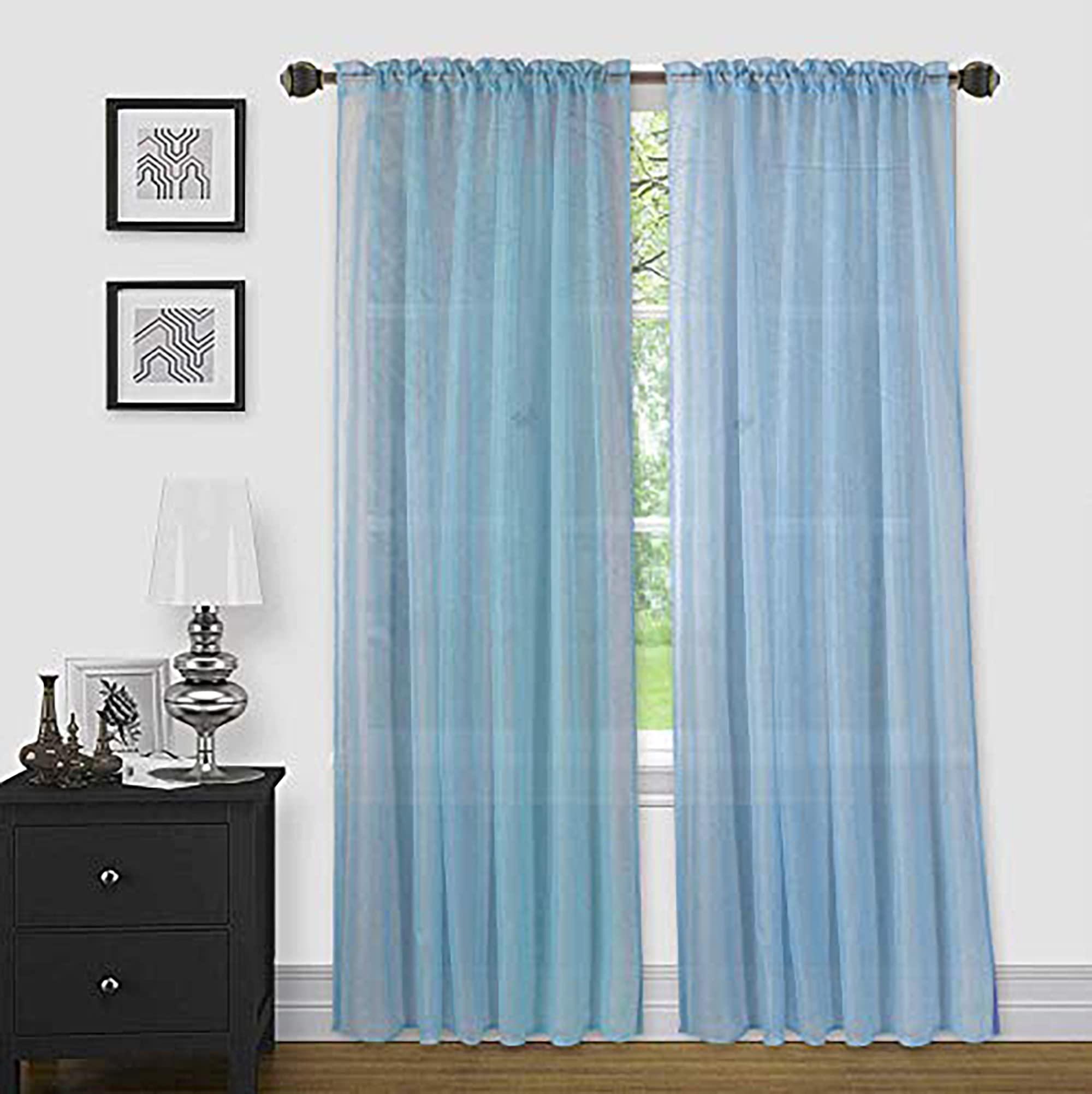 Install sheer curtains for a ‍breezy feel in your blue living room