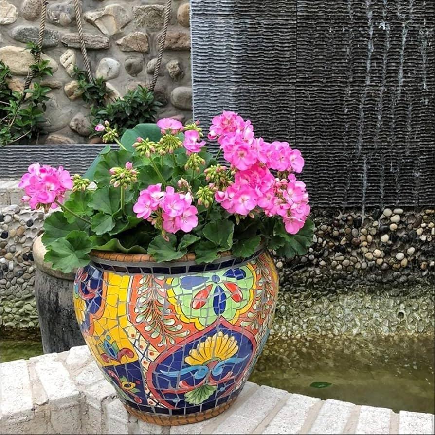 Add colorful planters to brighten your small balcony