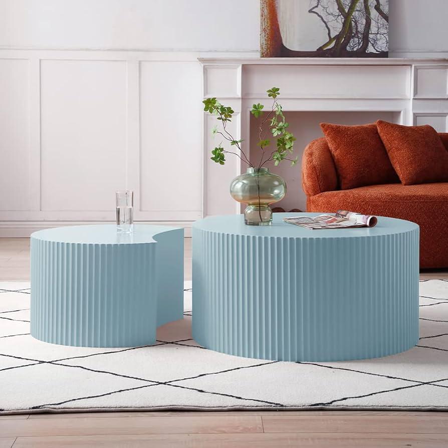 Use a stylish coffee table for functionality⁣ in⁣ your blue living room