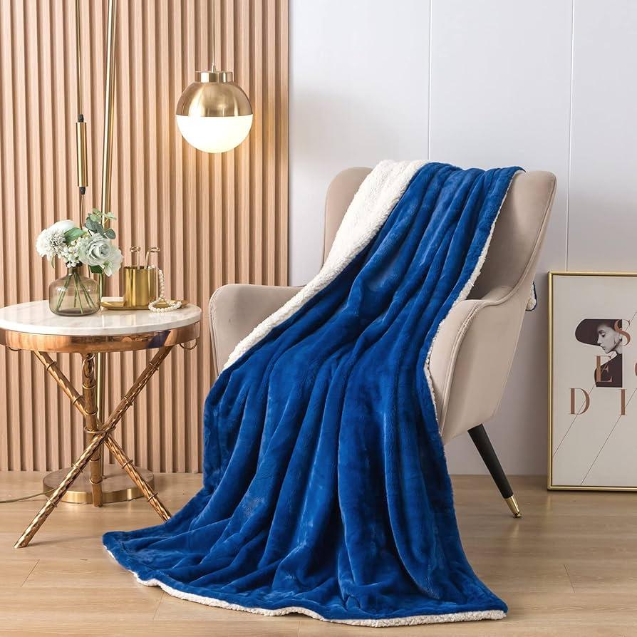 Soft blue throws add warmth and inviting texture to ‌spaces