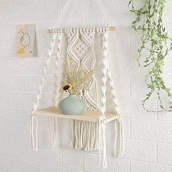 Hang‍ macramé wall art for a trendy boho bathroom effect