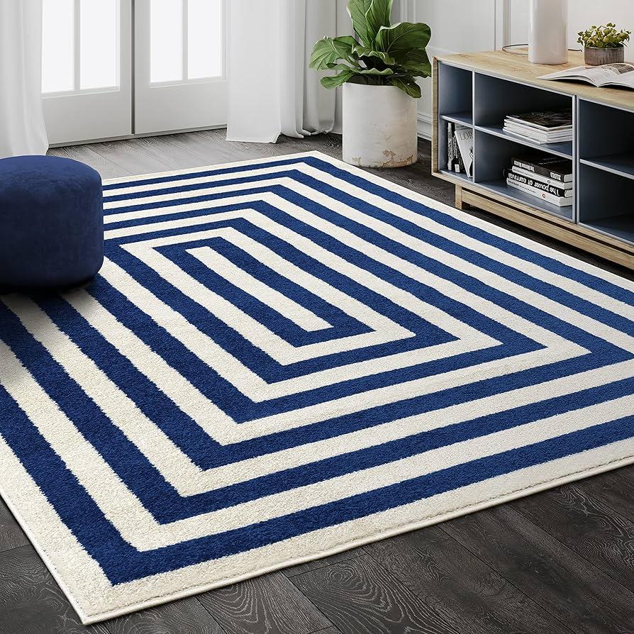 Incorporate stripes or geometric patterns for a modern blue living room