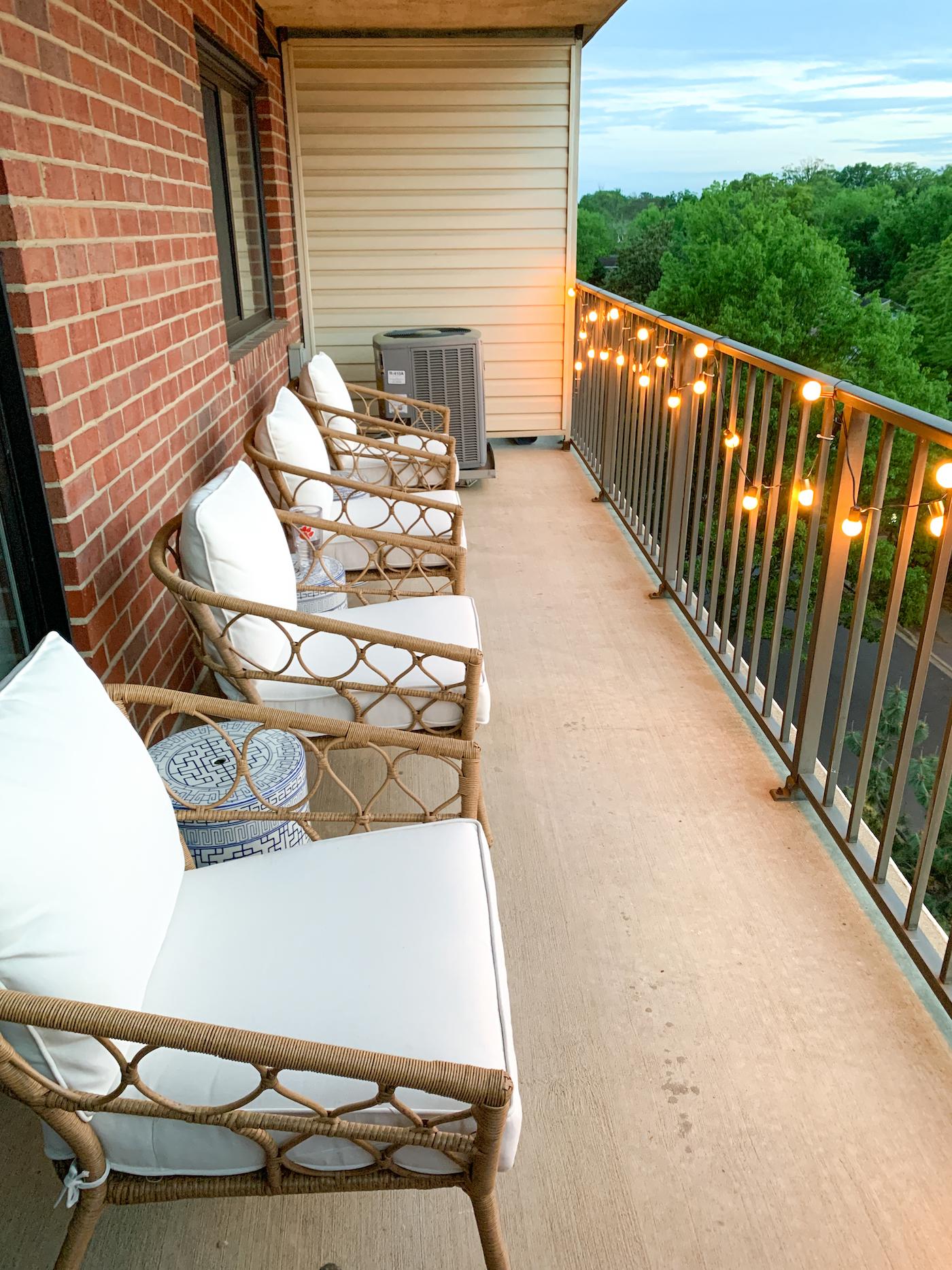 Hang fairy lights to add charm to your ‍small balcony