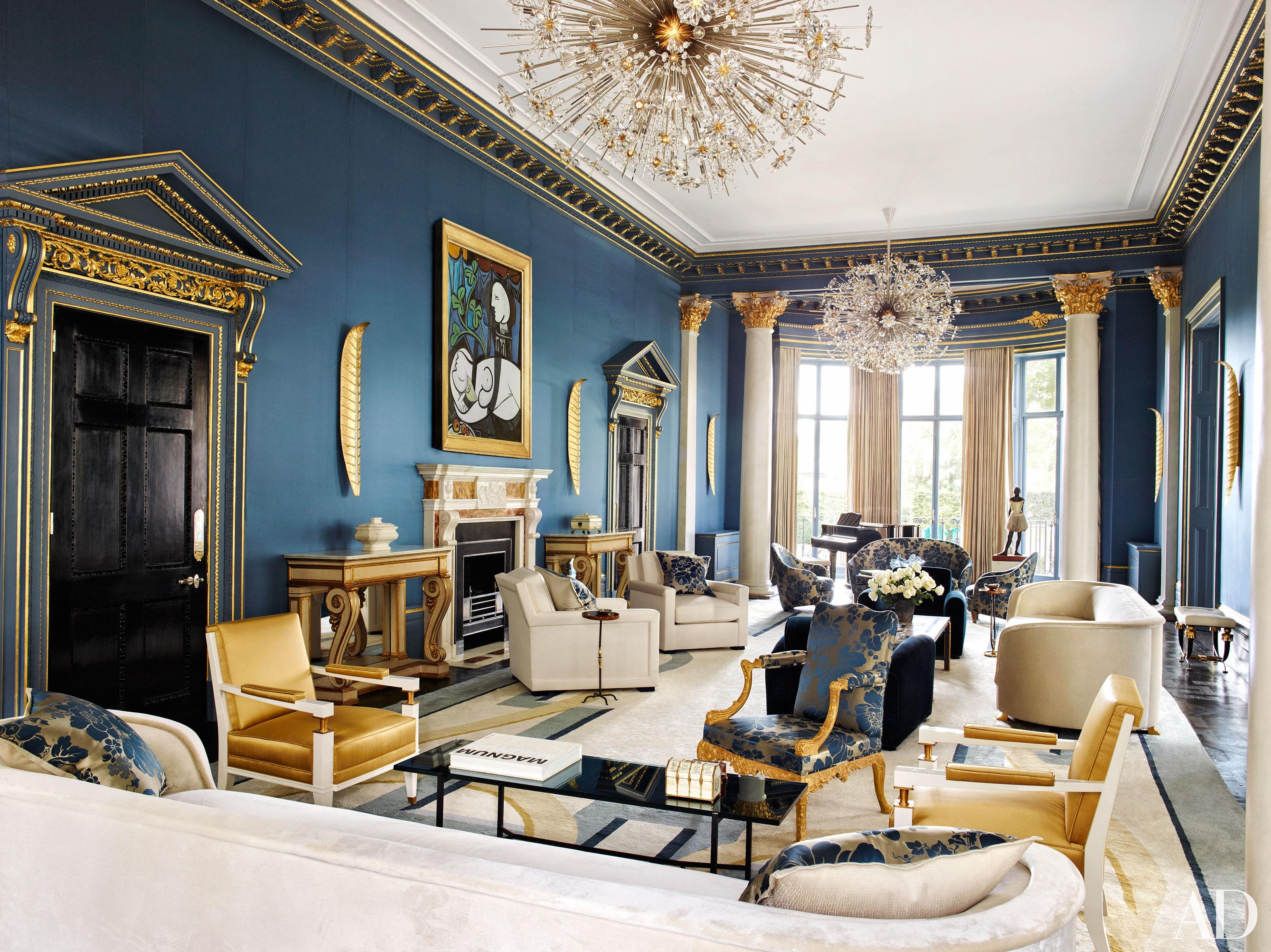 Incorporate gold​ accents for a luxurious blue living room