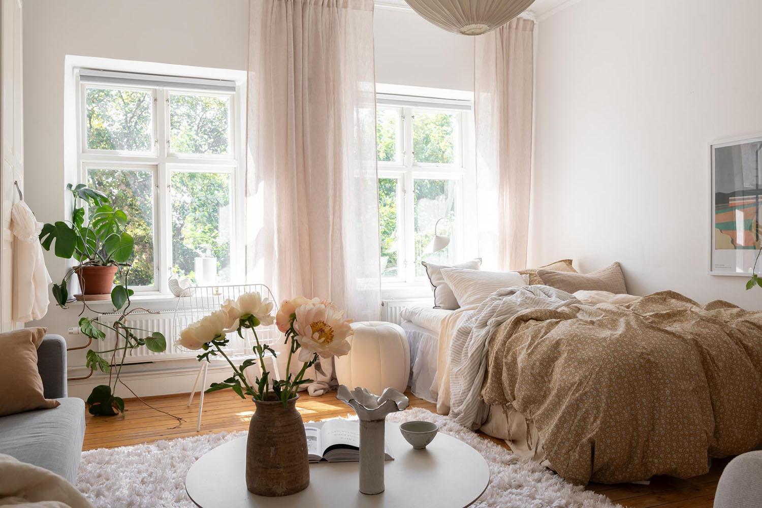 Scandinavian Bright Bedroom embracing light woods and pastel tones