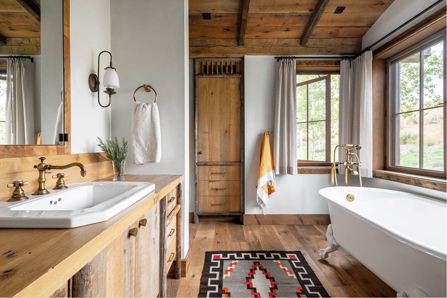 Rustic⁢ freestanding tubs create⁣ a luxurious‍ Chalet Bathroom experience