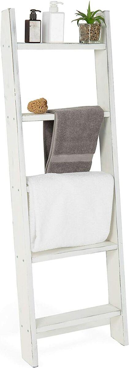 Implement a vintage ladder for⁤ towel storage in ‍your farmhouse bathroom