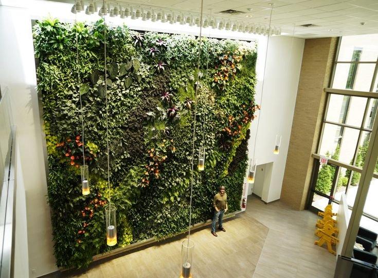 Add a biophilic design element ‌with a living green‍ wall in your Earthy Living Room