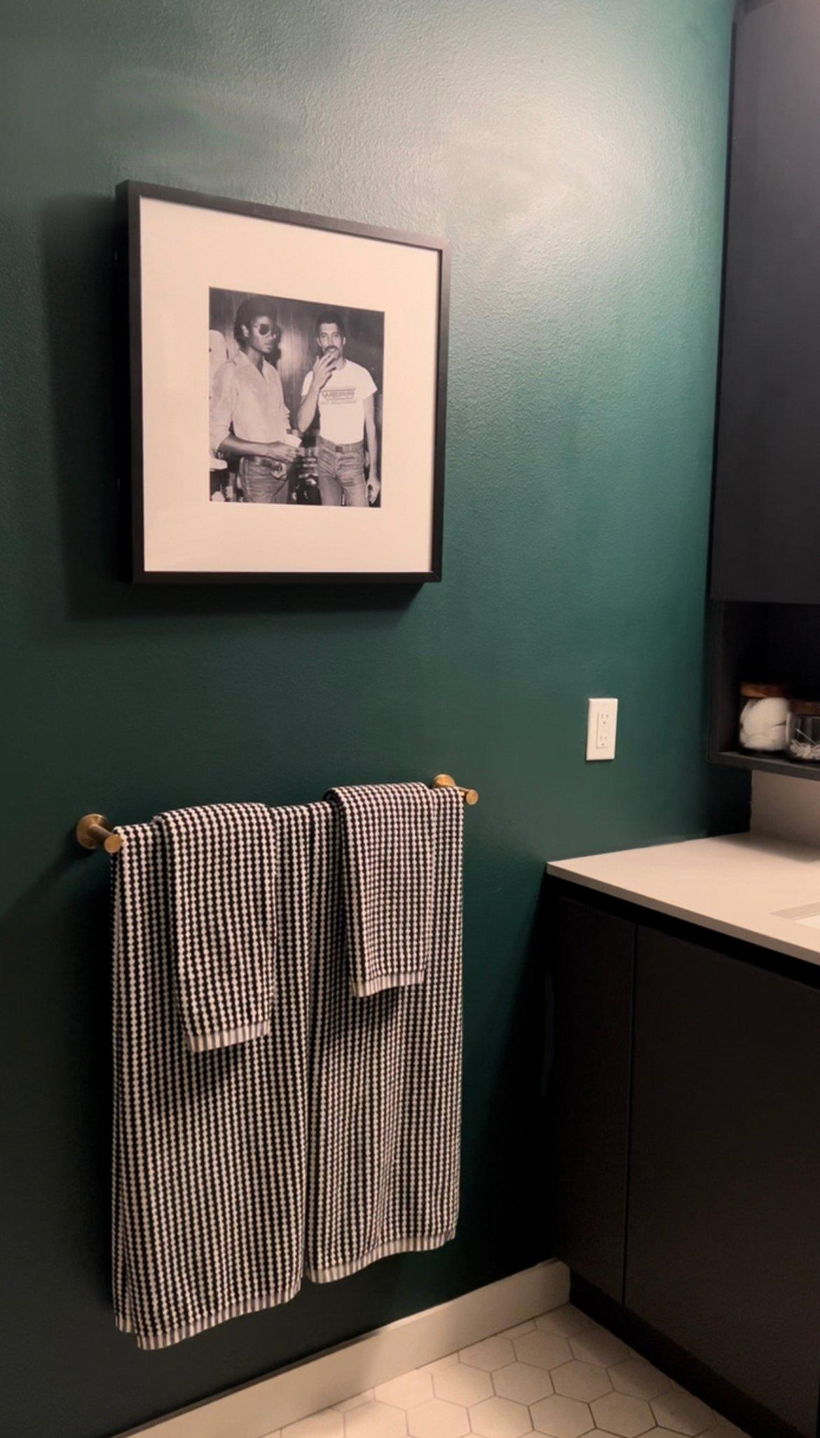 Mix‌ and match your towels in different textures for ​an eclectic bathroom feel