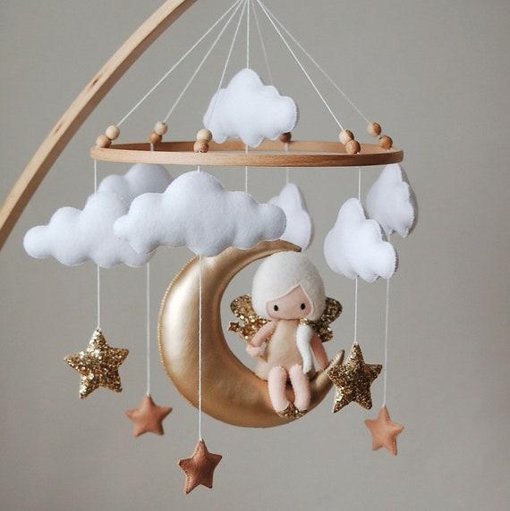 Hang a mobile to enhance visuals in your small nursery