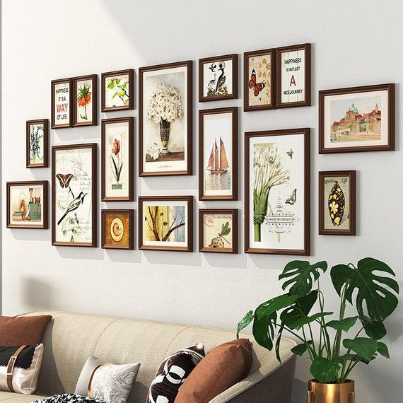 Showcase ​vintage photographs in charming frames around your living room