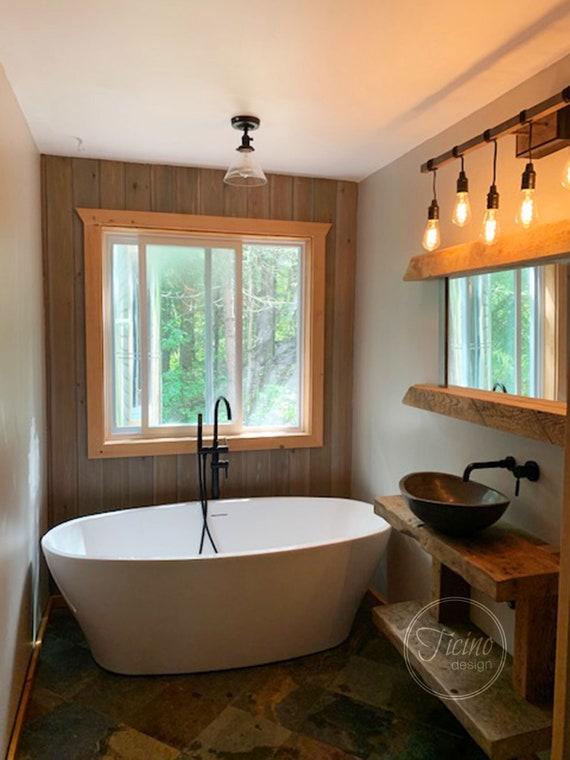 Transform your tub area with reclaimed wood paneling for a serene escape