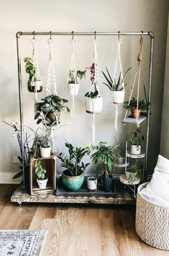 Hang macramé‍ plant hangers to elevate⁢ greenery in your earthy ⁢living room