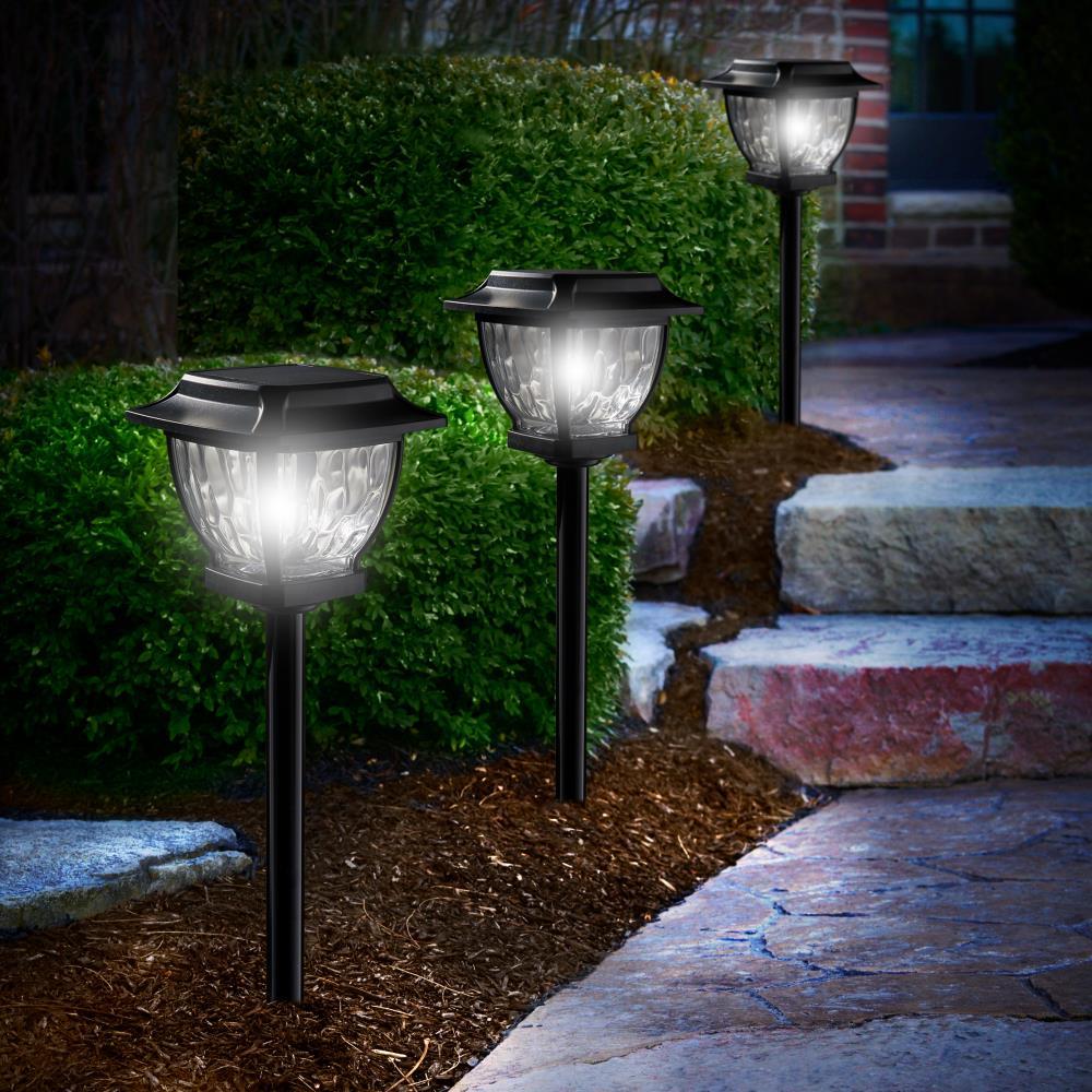 Incorporate solar ​lights for an eco-friendly backyard glow