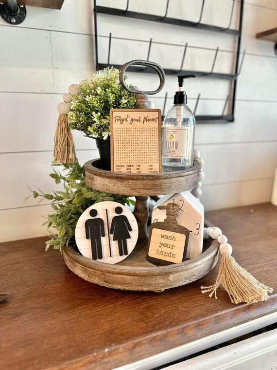 Layer textures with plush towels and woven baskets in your farmhouse bathroom