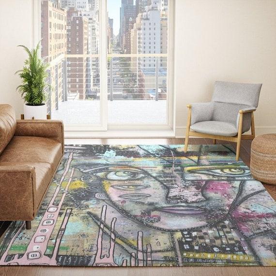 Use an oversized area rug to ground ⁢your eclectic living ⁣room design