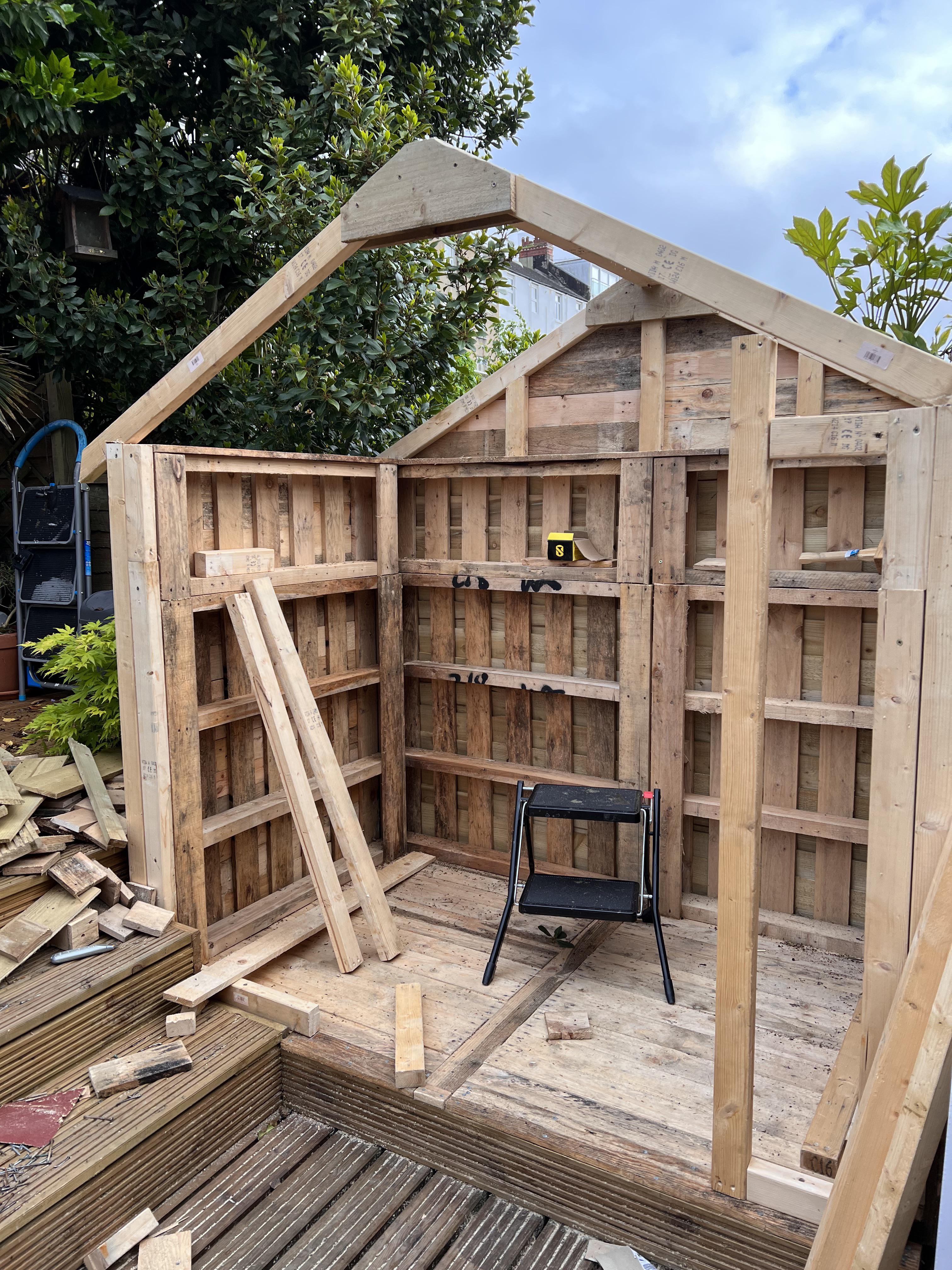 Rustic Pallet Garden Shed: Style​ your shed as a ​charming garden focal point