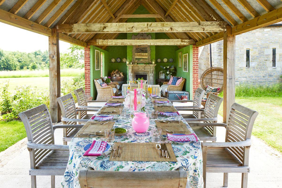 Add a small dining table​ for al fresco meals in your backyard