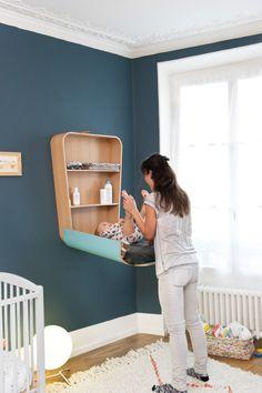 Incorporate a wall-mounted changing station⁣ in your small nursery