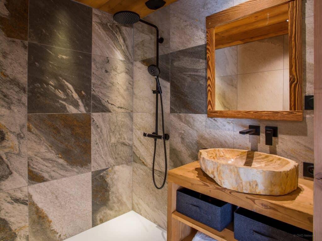 Soft, warm lighting enhances relaxation in your Chalet Bathroom