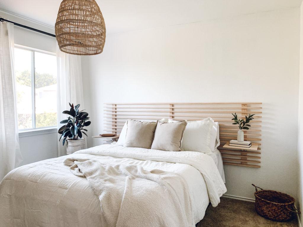 Select a​ sleek and simple headboard to complement a minimalist bedroom