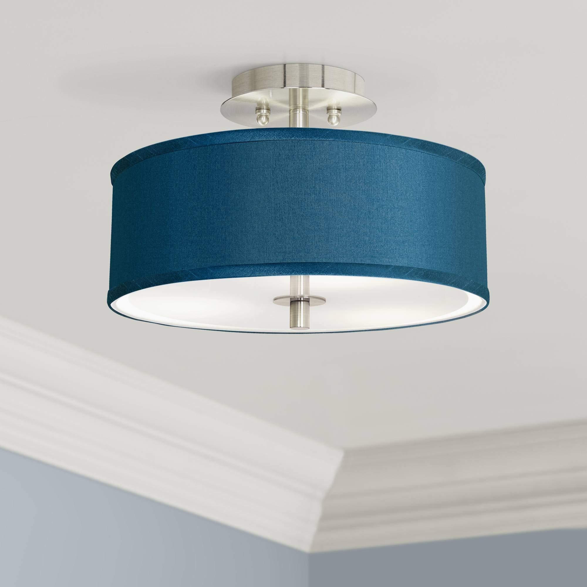 Choose blue lighting fixtures to accentuate your living⁣ room design