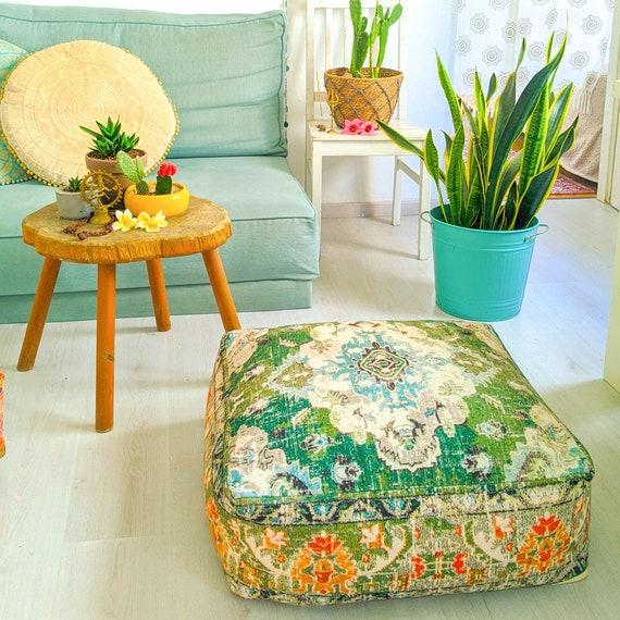 Use floor cushions and poufs to enhance seating in your Boho Living Room