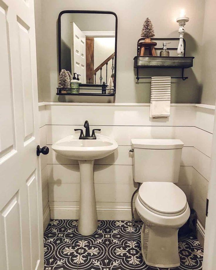 A freestanding sink creates a spacious feel in your farmhouse bathroom